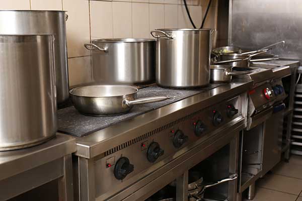 restaurant range with pots and pans